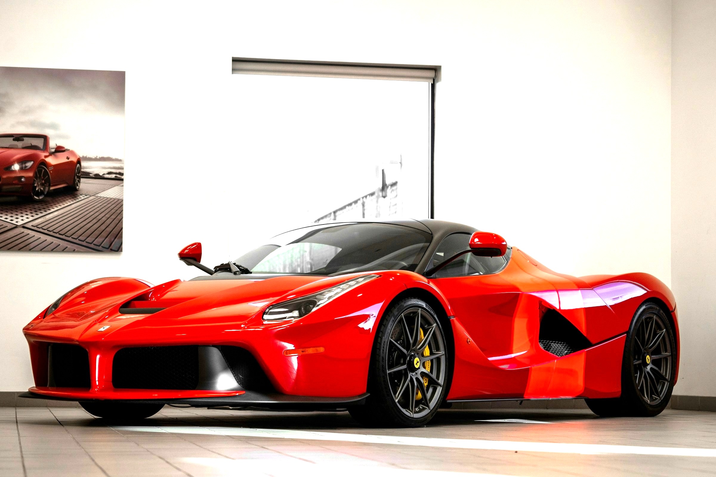 A collectible Ferrari presented through Movarna\u2019s Experience Center.